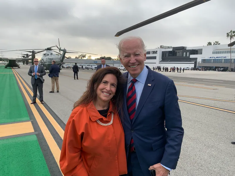Sue Himmelrich standing with President Joe Biden.