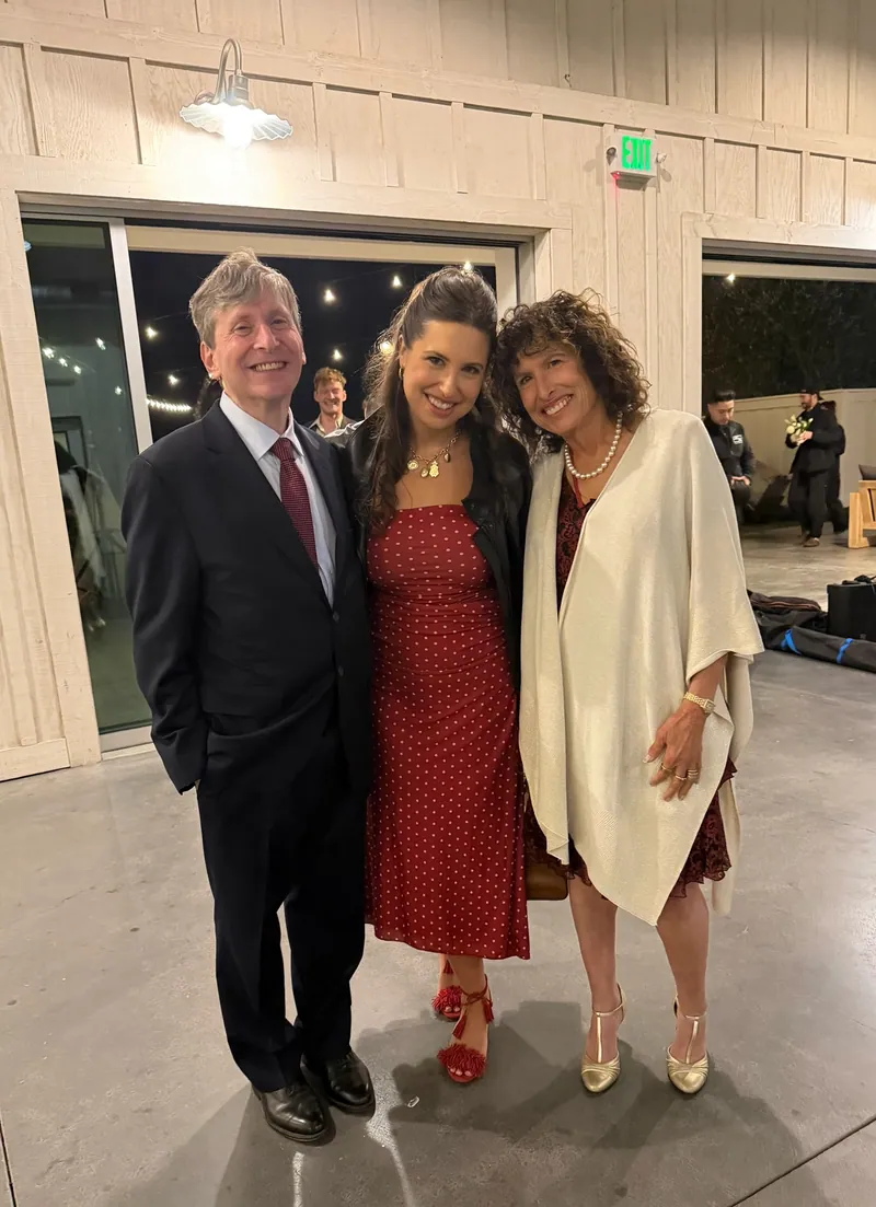 Sue Himmelrich with family at an evening gathering.